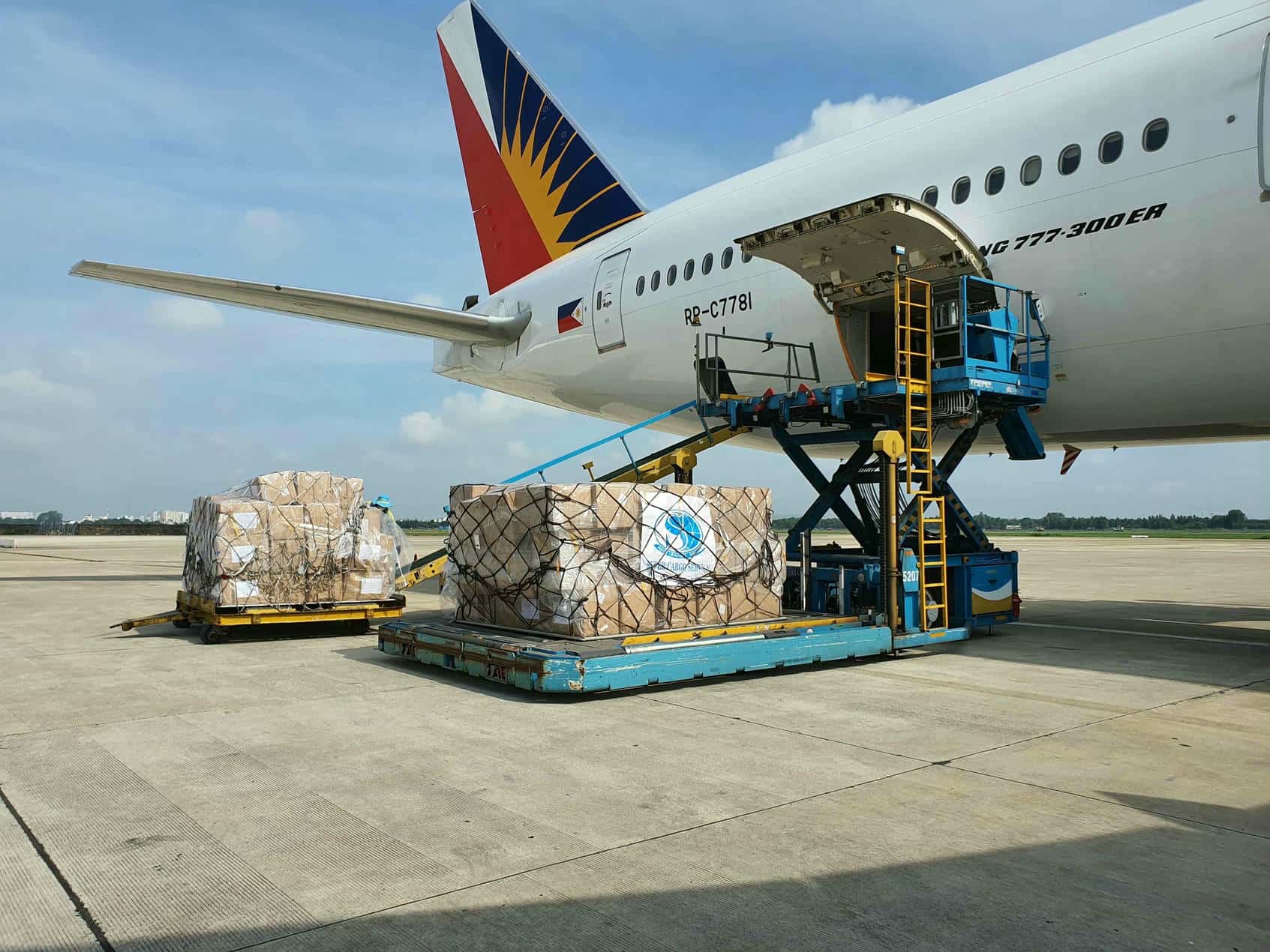 Air freight logistics with cargo plane in the sky